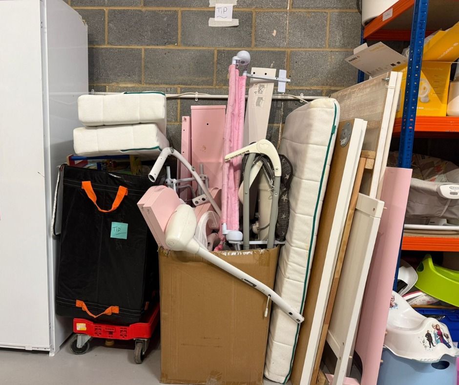 Checked cots, high chairs and baby equipment ready for families